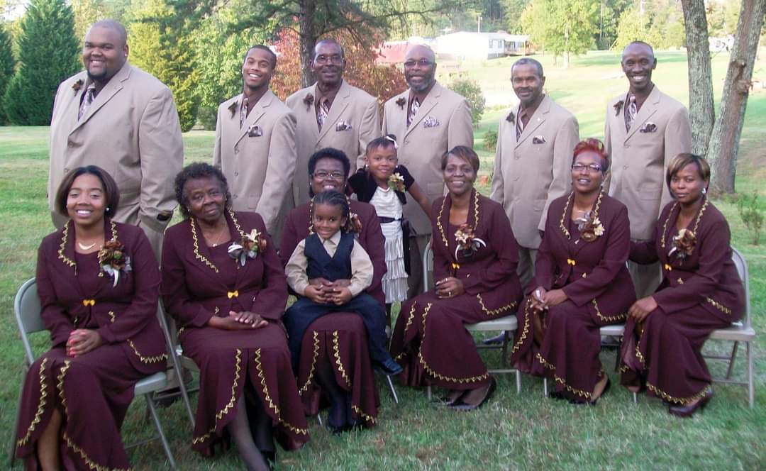 The Torain Family at their 41st anniversary, pictured with their founder, Frances Torain