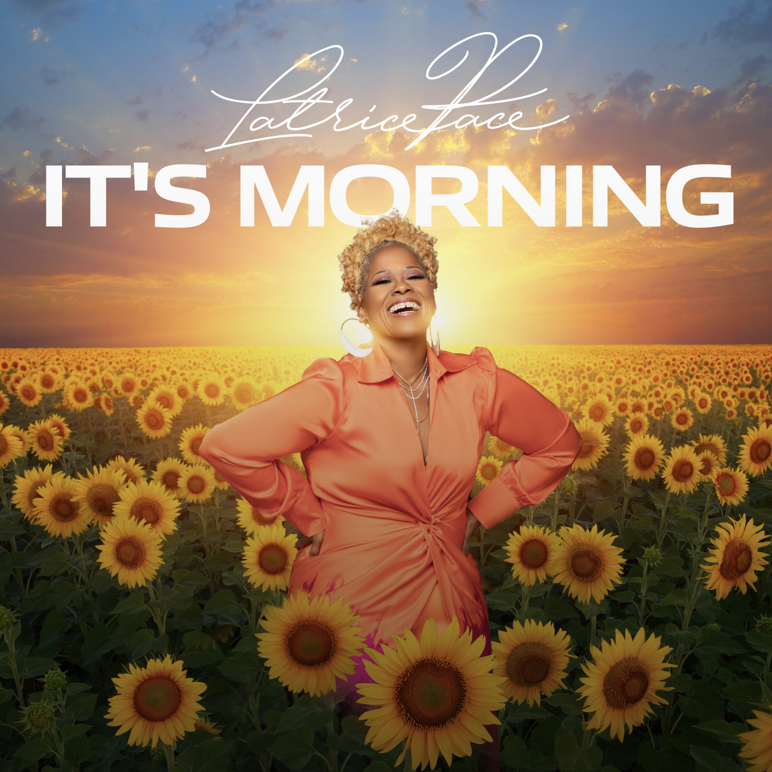 Latrice Pace in a field of sunflowers on her artwork